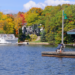 Serene Muskoka lake view with gazebo and boathouse, frequented by celebrities during summer - Jayne's Luxury Rentals.