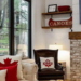 Cozy cottage living room with a warm fireplace and Canadian-themed decor, illustrating Jayne's Luxury Rentals' blog on fresh decorating tips