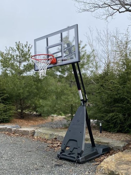Basketball hoop available for guests enjoying outdoor activities at Jayne's Luxury Rentals properties