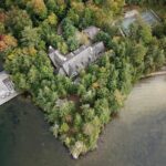 The Regency Estate in Port Carling - Jayne's Luxurious Rentals | Secluded luxury retreat with private shoreline and tennis court