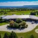 Aerial view of Stonethrow property in Bruce Peninsula (Wiarton) Thornbury - Jayne's Luxurious Rentals | Expansive estate with lush greenery and ocean views