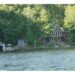 Hemlock Ridge Cottage nestled in lush greenery by the lake with dock - Praised by Jennifer for cleanliness and comfort - Jayne's Luxury Rentals