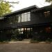 The striking black exterior of the Luxury Cottage White House cottage in Muskoka, a distinctive property offered by Jayne's Luxury Rentals